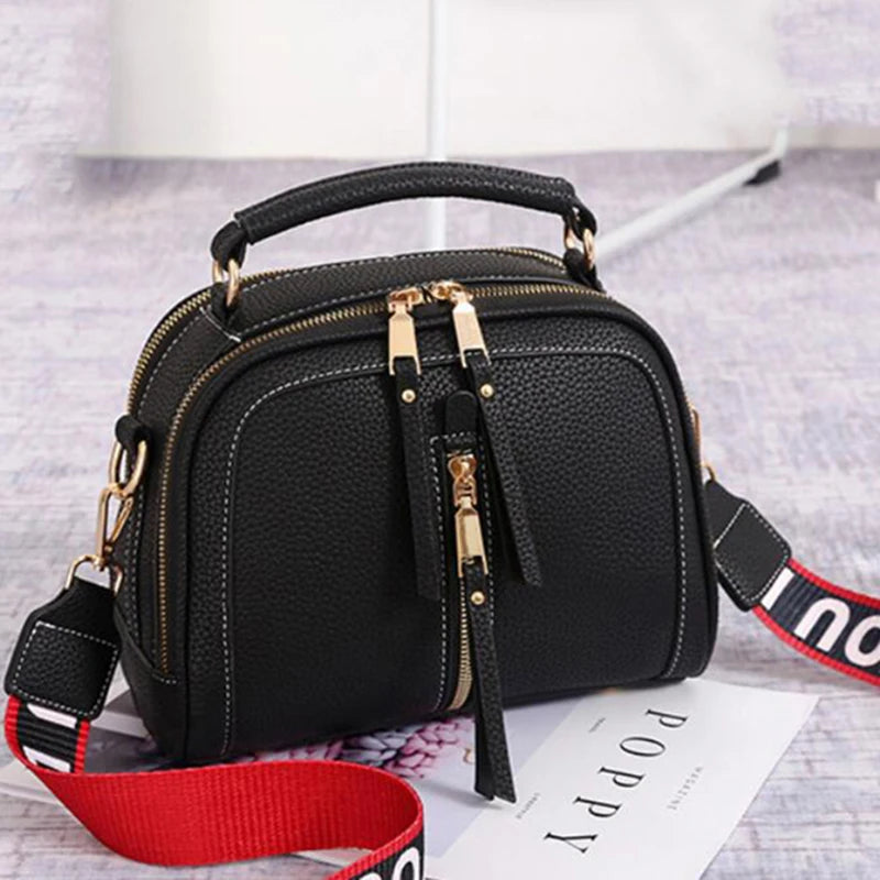 Bolsa Feminina em Couro Plutônio crossbody com alça transversal removível